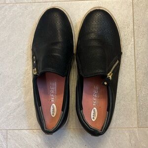 Black slip on sneakers